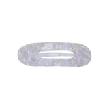 Oval lay flat acrylic claw clip in Pearl, classic size, a pearly white hair claw clip with an open center, on a white background.