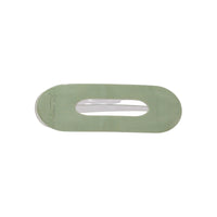 Oval lay flat acrylic claw clip in Soft Sage, classic size, a soft sage green hair claw clip with an open center, on a white background.
