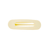 Oval lay flat claw clip in Buttercream, classic size, a matte pale butter yellow hair claw clip with an open center, on a white background.