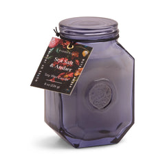 Botanica sea salt and amber candle in tinted glass