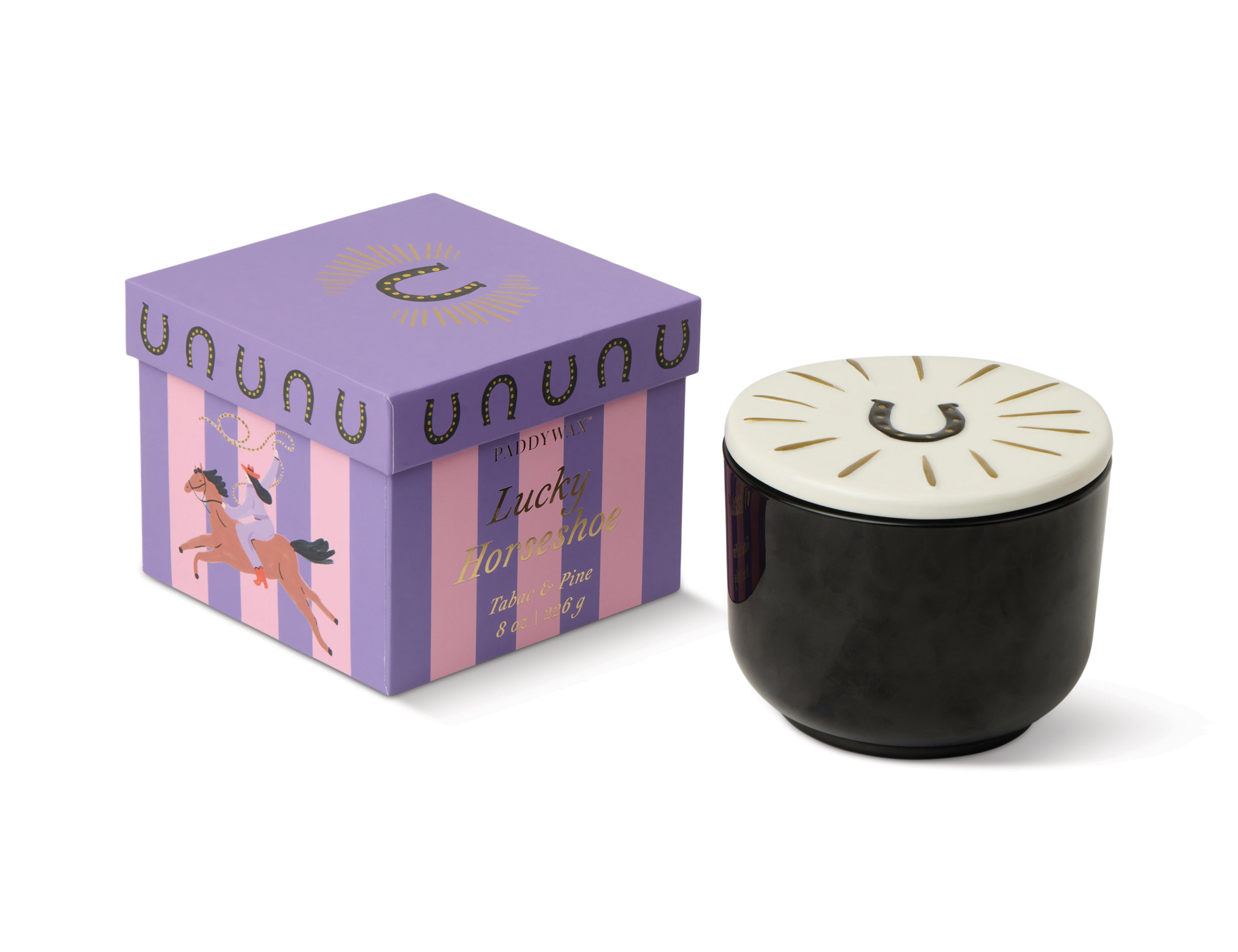 Charmed black glass candle with a ceramic horseshoe lid, second view