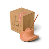 Ceramic cowboy hat incense holder, third view
