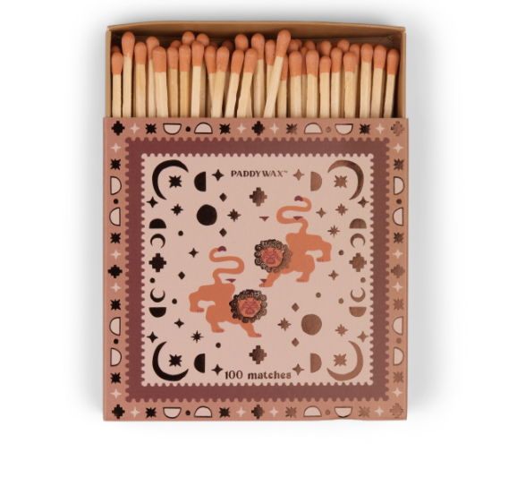 Dusty pink Paddywax matchbox with lions, moon phases and stars, terracotta match tips