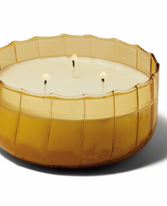 Wide ribbed amber glass Paddywax Ripple candle with three wicks