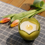 Teal tulip shaped glass candle, fifth view