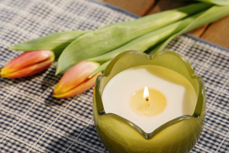 Teal tulip shaped glass candle, fifth view