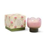 Paddywax Tulip Glass Candle in Bronzed Gardenia, a pink tulip-shaped glass candle beside its floral box