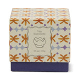 Paddywax Tulip Glass Candle box with an orange and purple floral pattern, 5.5 oz