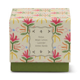 Paddywax Tulip Glass Candle box with a pink and green floral pattern, notes of Meyer lemon, lavender and amber sands