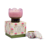 Paddywax Tulip Glass Candle in pink glass on its floral box with a matching travel tin