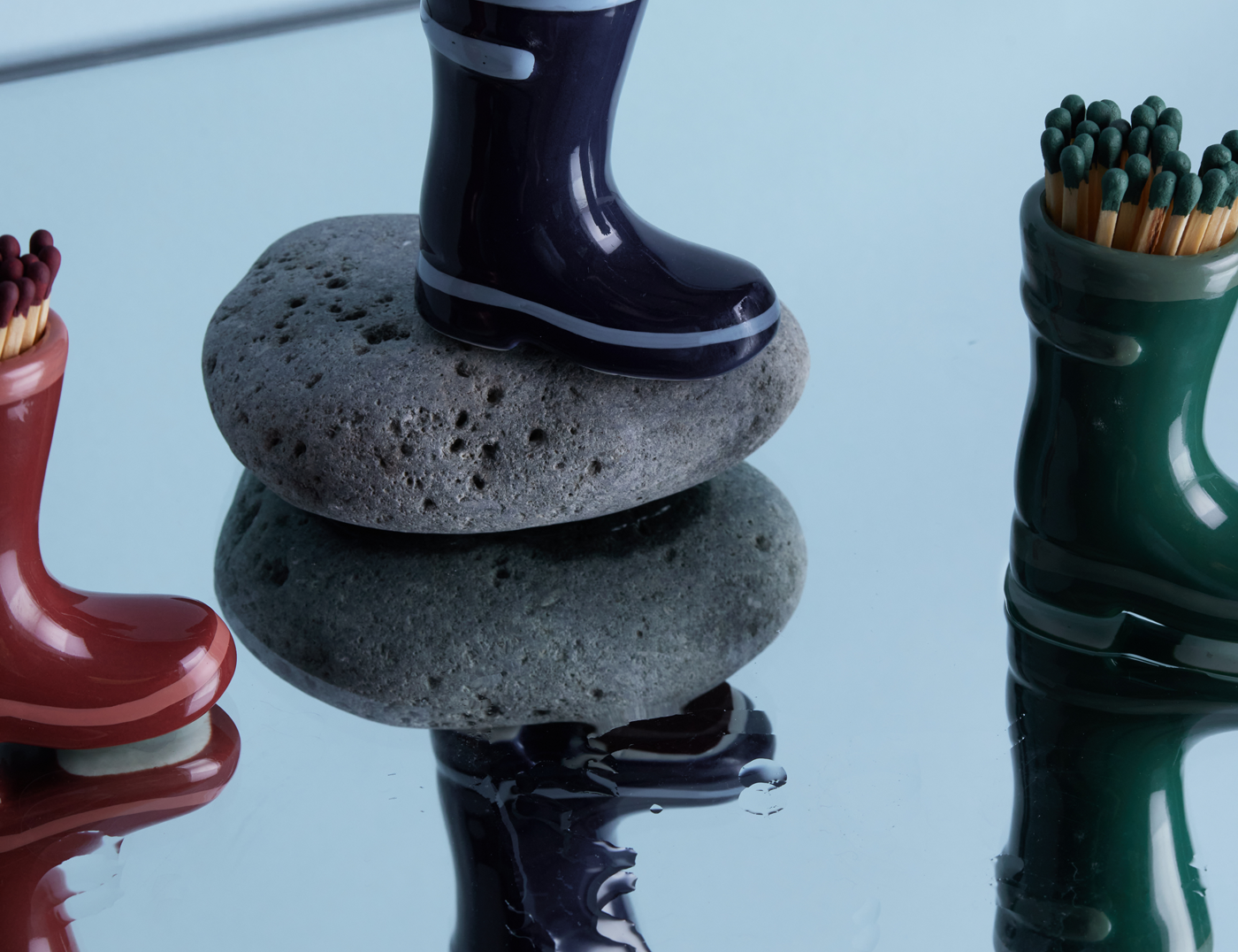 Colorful ceramic rain boot match holders
