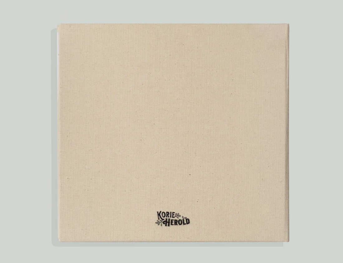 Paige Tate & Co As You Grow Memory Book, plain cream linen back cover with embossed logo