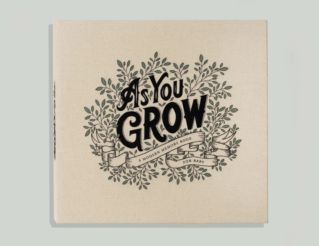 Paige Tate & Co As You Grow Memory Book, cream linen cover with black botanical lettering