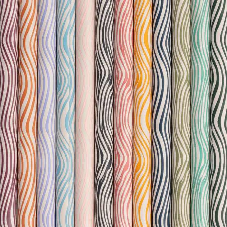 Close-up of the wavy patterned barrels on the Papier Color Away Coloring Pencil Set of 12
