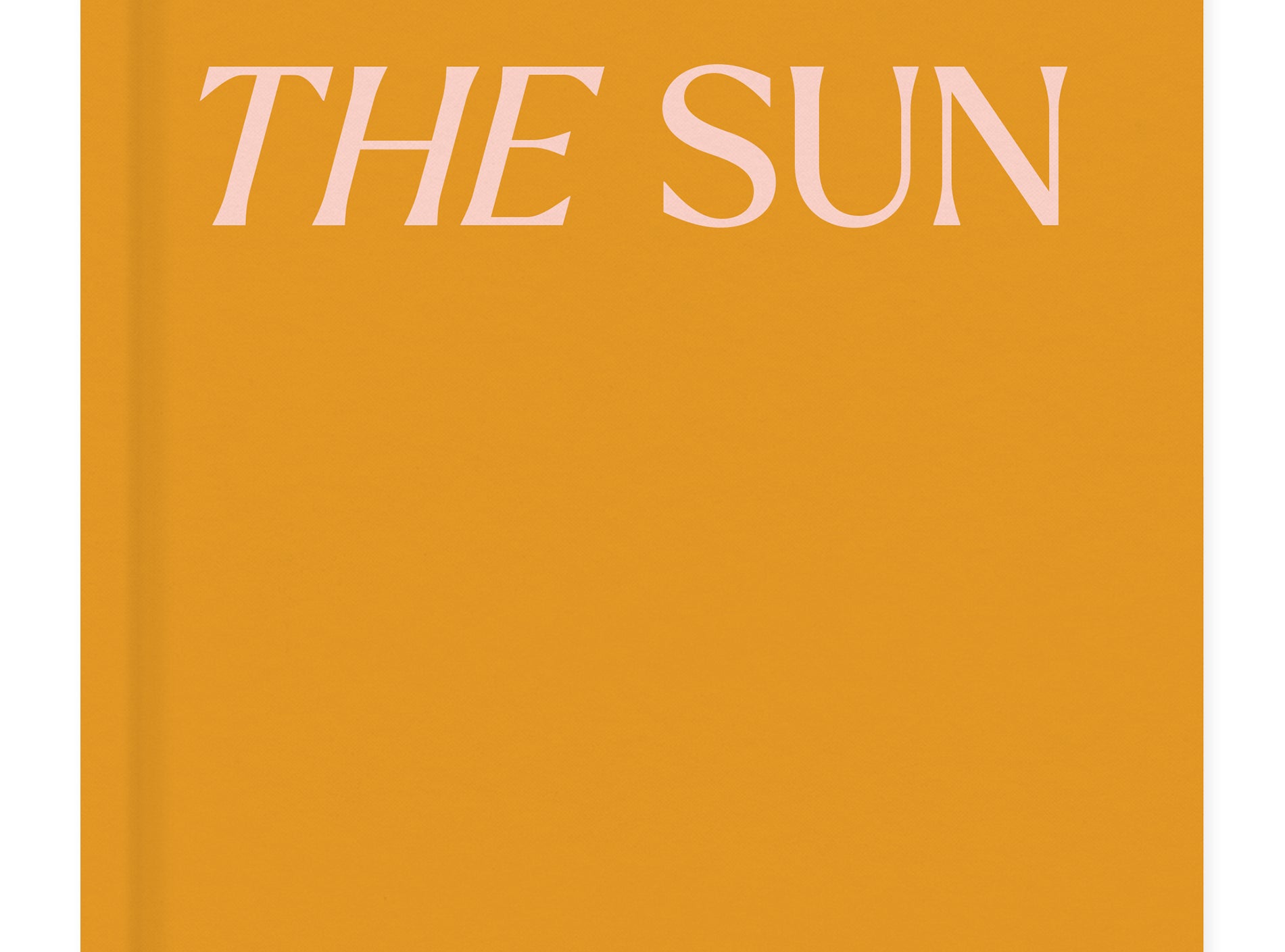 Papier Follow the Sun Travel Journal, an orange hardcover with pink lettering