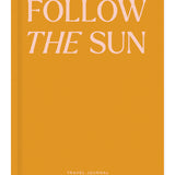 Papier Follow the Sun Travel Journal, an orange hardcover with pink lettering