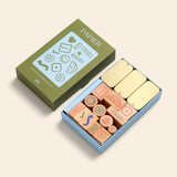 Papier Good Day Stamp Planner Set, an olive green box of wooden rubber stamps and gold ink pads