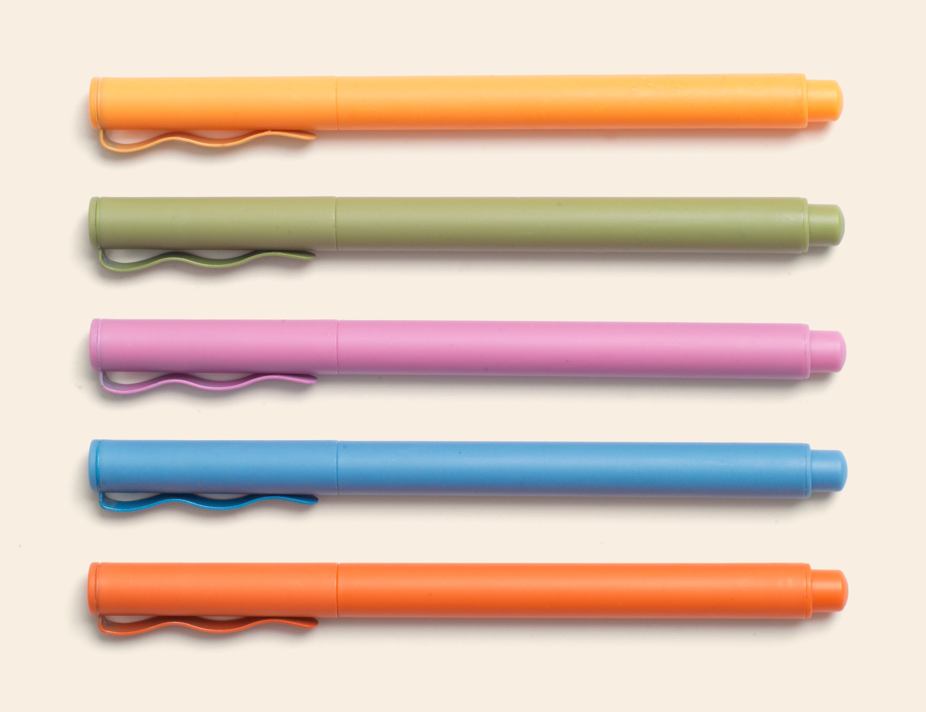 Papier High Energy Fineliners Set, five pens in orange, green, pink, blue and coral lined up in a row