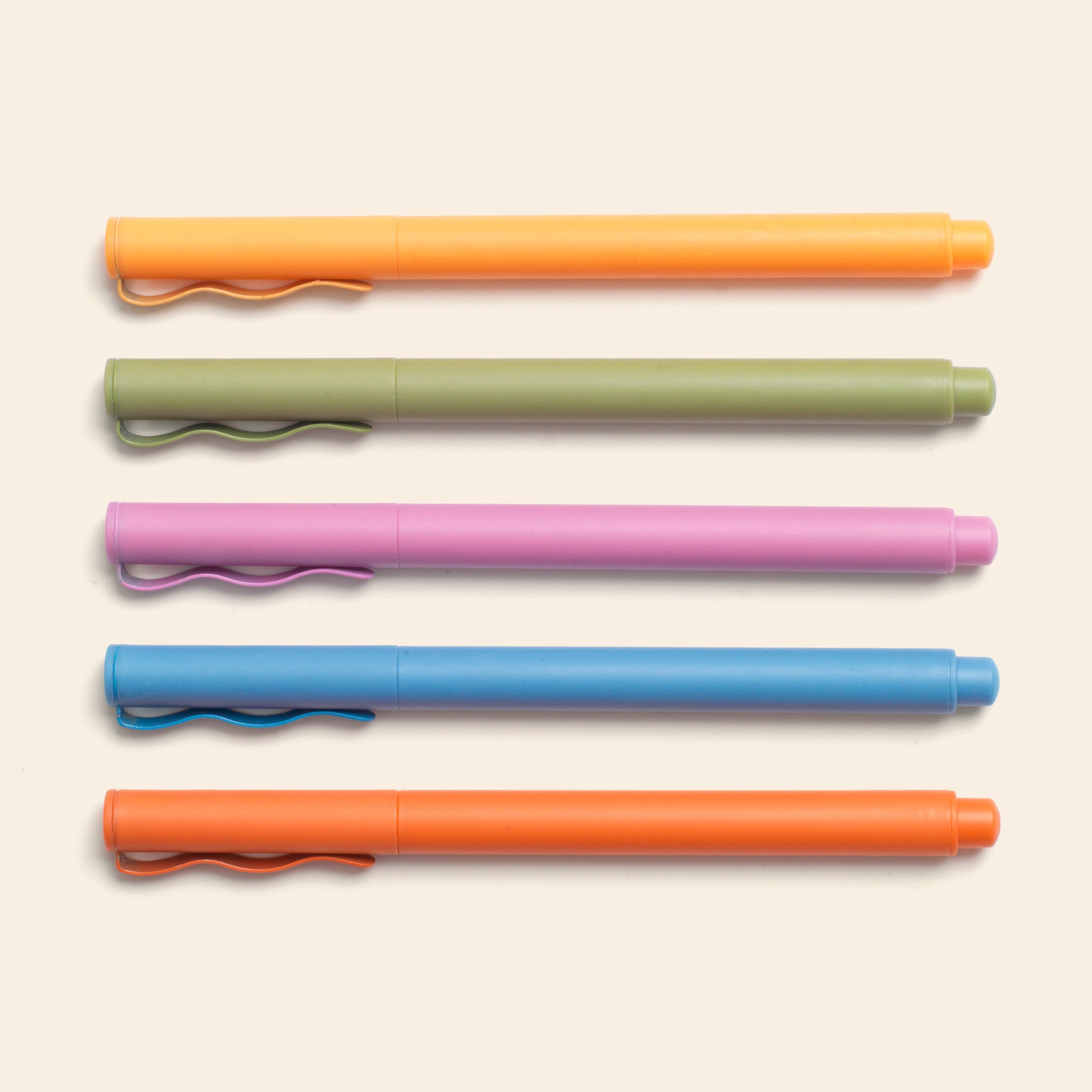 Papier High Energy Fineliners Set, five pens in orange, green, pink, blue and coral lined up in a row