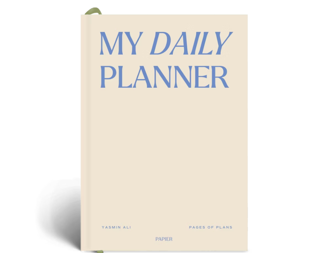 Papier My Daily Planner in Wonder, a cream hardcover with blue lettering