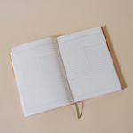 Papier My Daily Planner Wonder open to a daily schedule spread