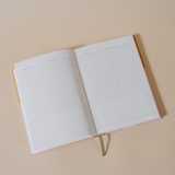 Papier My Daily Planner Wonder open to a daily schedule spread