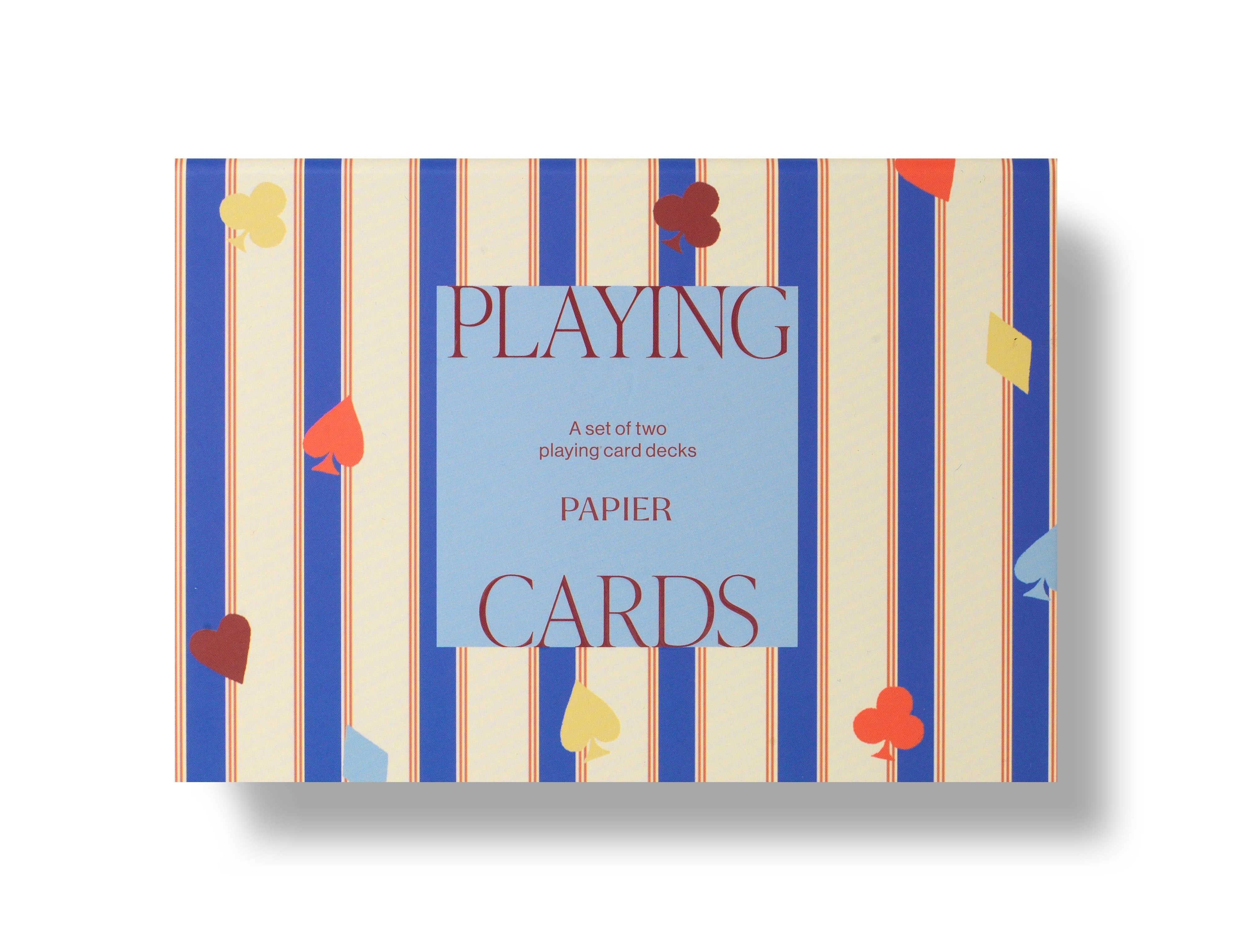 Papier Playing Cards Set of 2 in Suits & Stripes, a blue and cream striped box with card suit confetti