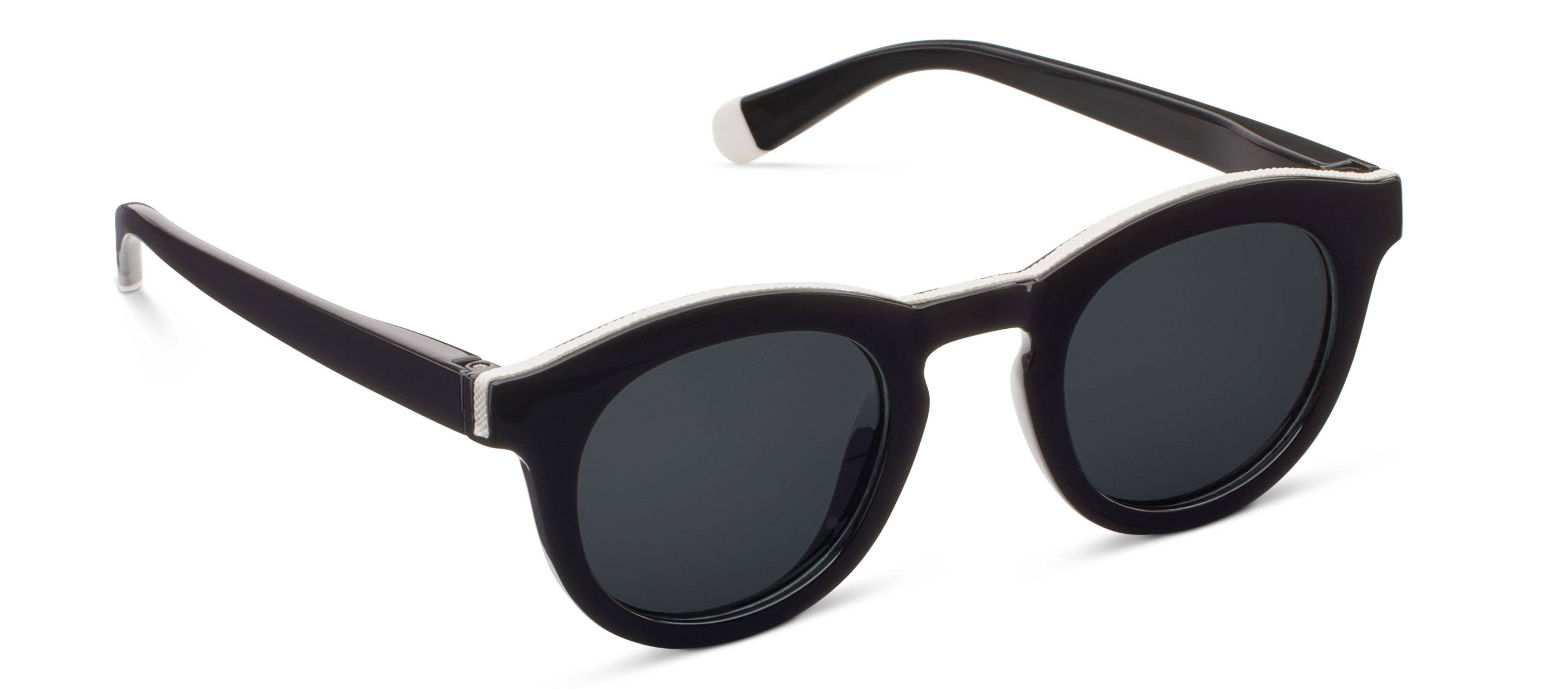 Peepers Beverly Shores Sunglasses in black, round frames with dark lenses, angled view
