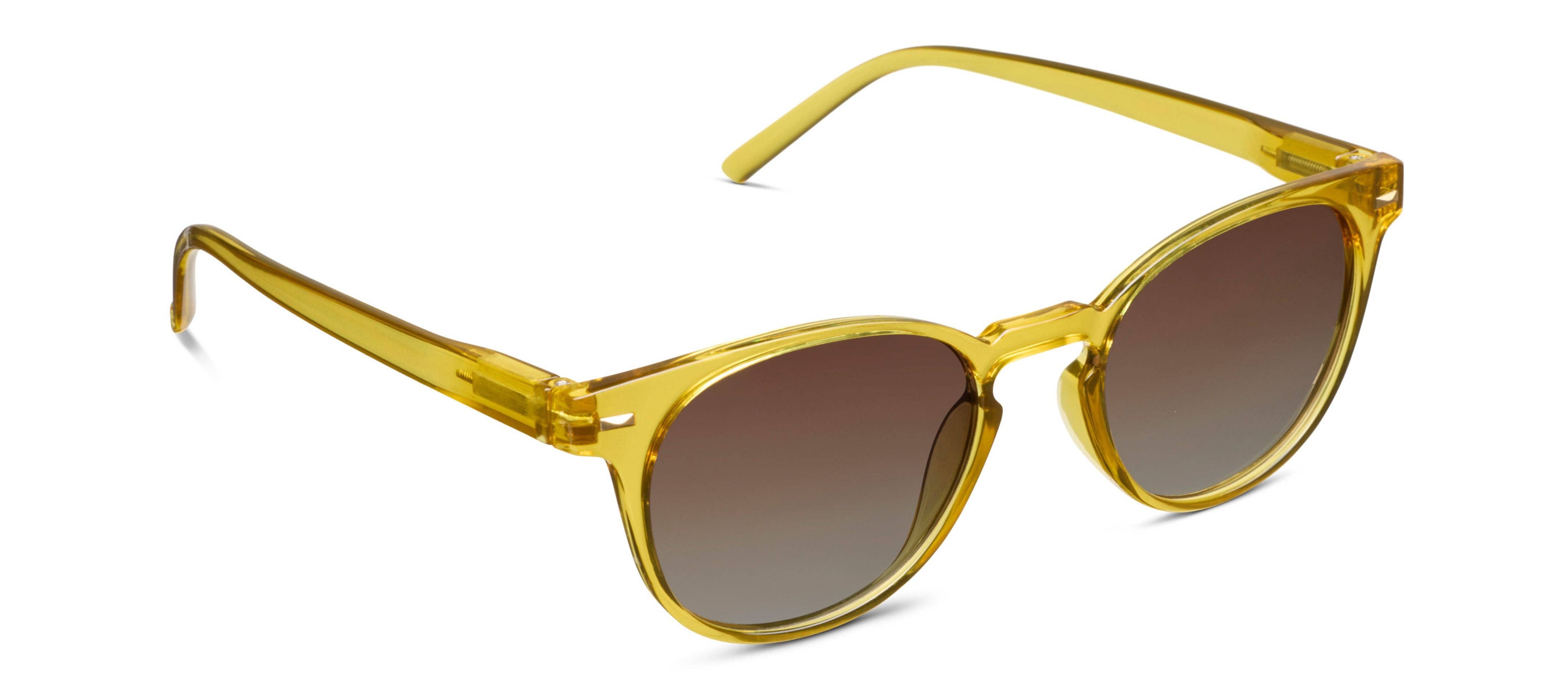 Peepers Boho II Sunglasses in translucent honey yellow with brown gradient lenses, angled view