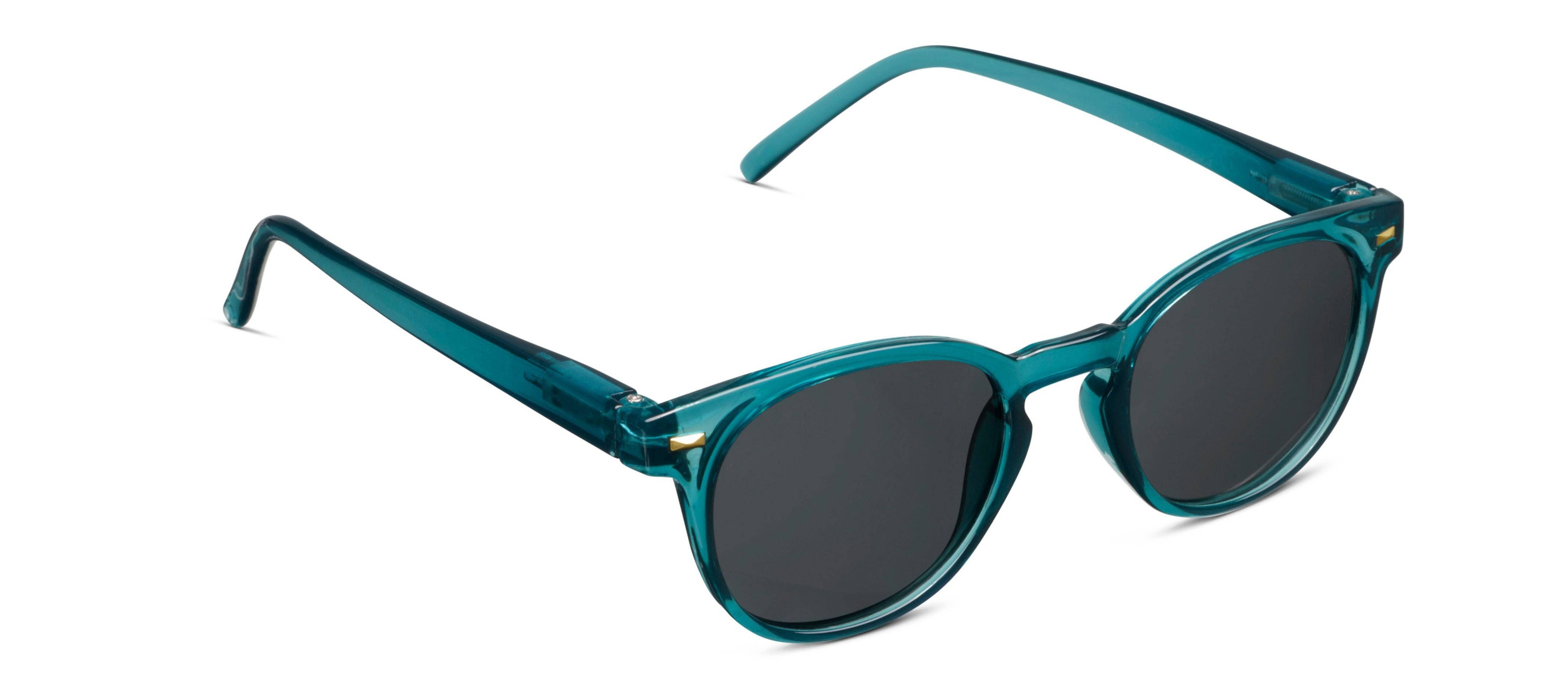 Peepers Boho Sunglasses in Teal, translucent teal round frames with dark lenses, angled view