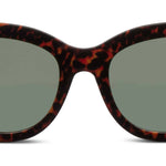 Peepers Capri Sunglasses in Leopard Tortoise, close-up of the cat-eye frames and green lenses