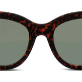 Peepers Capri Sunglasses in Leopard Tortoise, close-up of the cat-eye frames and green lenses