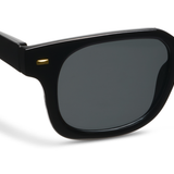 Peepers Clubhouse Sunglasses in Black, close-up of the frame and dark lens