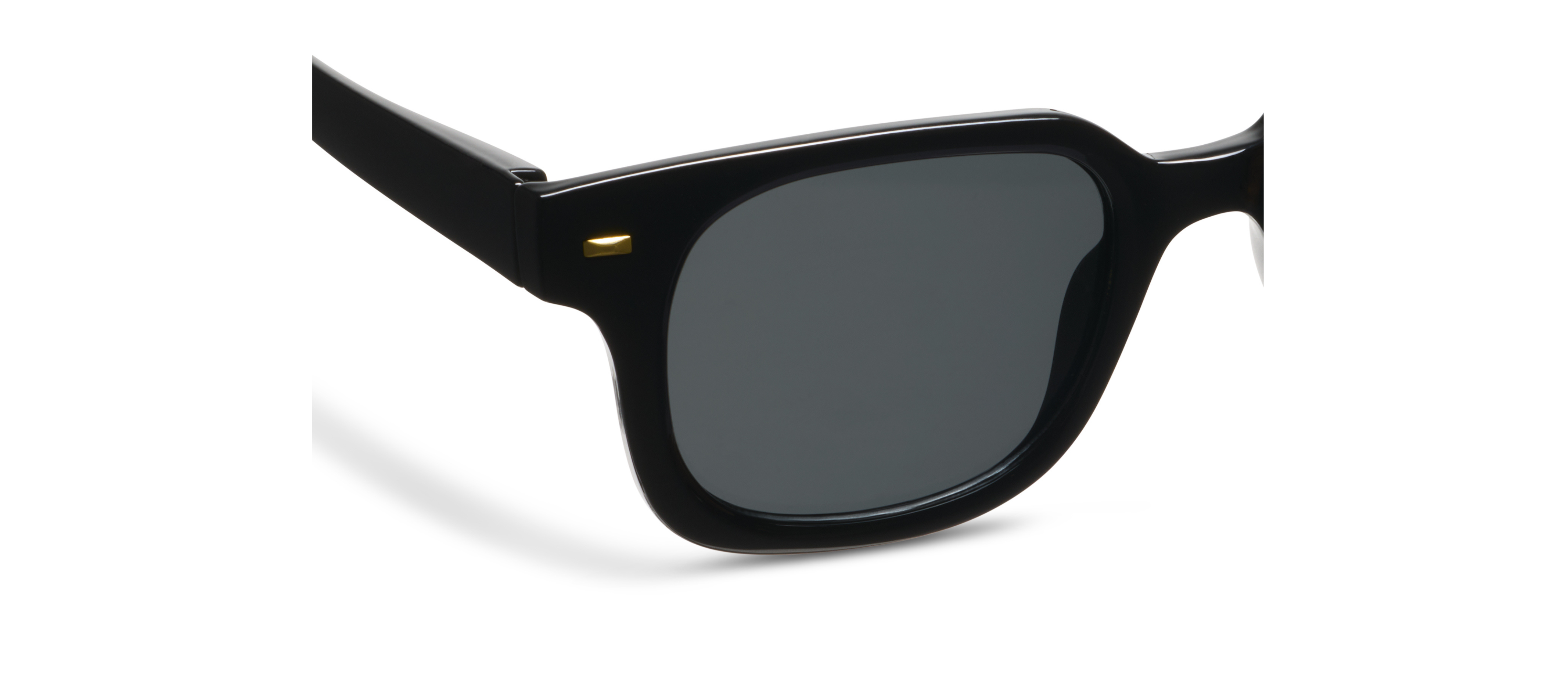 Peepers Clubhouse Sunglasses in Black, close-up of the frame and dark lens