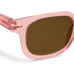 Peepers Clubhouse Sunglasses in Blush, close-up of the frame and brown lens