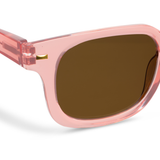 Peepers Clubhouse Sunglasses in Blush, close-up of the frame and brown lens