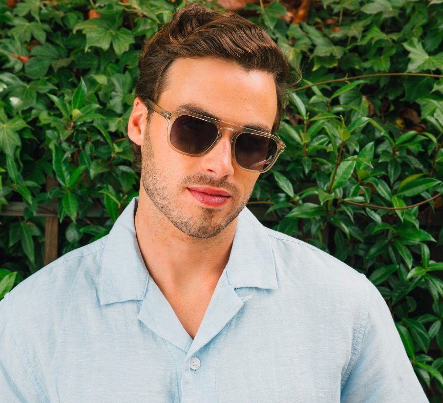 Man in a light blue shirt wearing Peepers Deep Dive Sunglasses in Fog outdoors