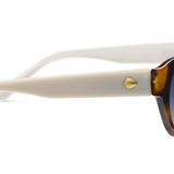 Peepers En Route Sunglasses in Tortoise/White, side view of the white temple arm with gold accent