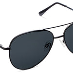 Peepers Ultraviolet Sunglasses in Black, metal aviator frames with dark lenses, angled view
