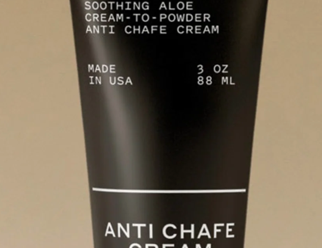 Preston Anti-Chafe Cream, close-up of the black 3 oz tube label reading soothing aloe cream-to-powder