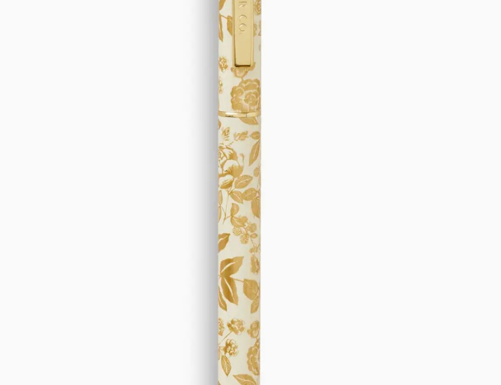 Rifle Paper Co. English Rose Pen, a slim pen with a cream and gold floral pattern