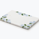 Rifle Paper Co. Hydrangea Memo Notepad shown at an angle with a striped edge