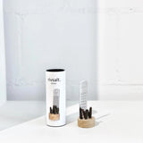 Rivsalt Pepper Stainless Steel Grater with long pepper on a wooden stand beside its white tube