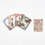 RoomyTown Animal Kingdom Playing Cards, four vintage animal cards fanned beside a marbled card back