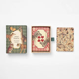 RoomyTown Animal Kingdom Playing Cards, the box beside a four of hearts card and a marbled card back
