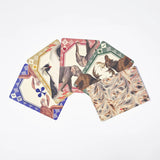 RoomyTown Animal Kingdom Playing Cards fanned out showing vintage animal illustrations and marbled card backs
