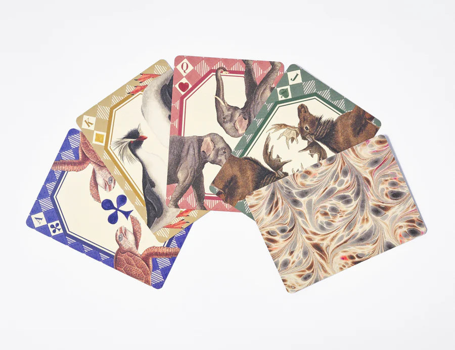 RoomyTown Animal Kingdom Playing Cards fanned out showing vintage animal illustrations and marbled card backs