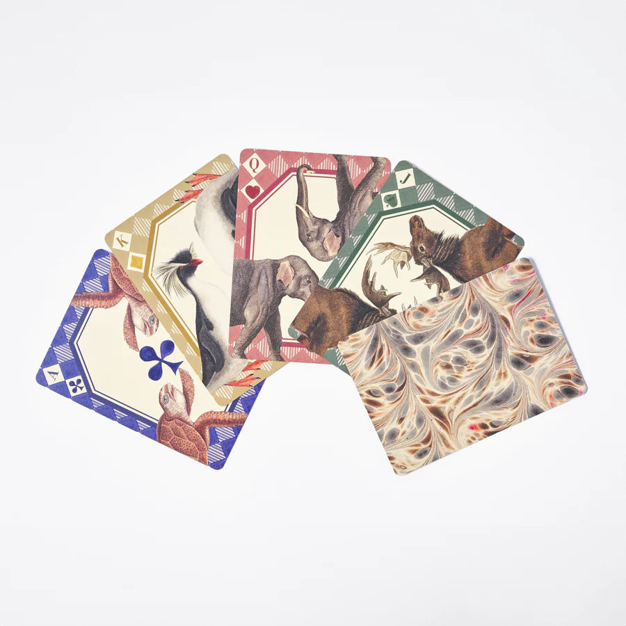 RoomyTown Animal Kingdom Playing Cards fanned out showing vintage animal illustrations and marbled card backs