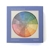 RoomyTown Color Wheel 500-Piece Round Jigsaw Puzzle, a blue box with a rainbow color wheel on the front