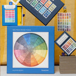 RoomyTown Color Wheel 500-Piece Round Jigsaw Puzzle box displayed with matching color-wheel stationery